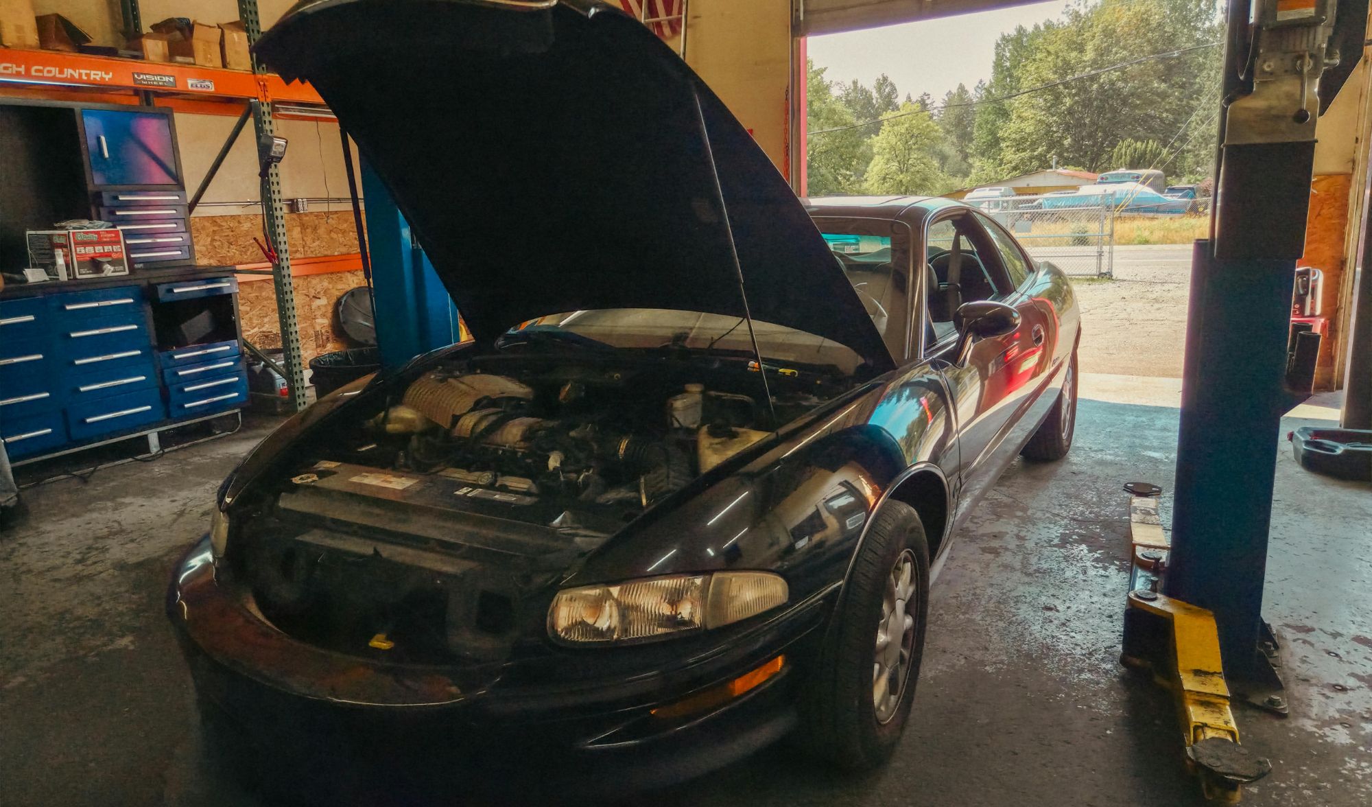 Under-hood engine work at Auto Star