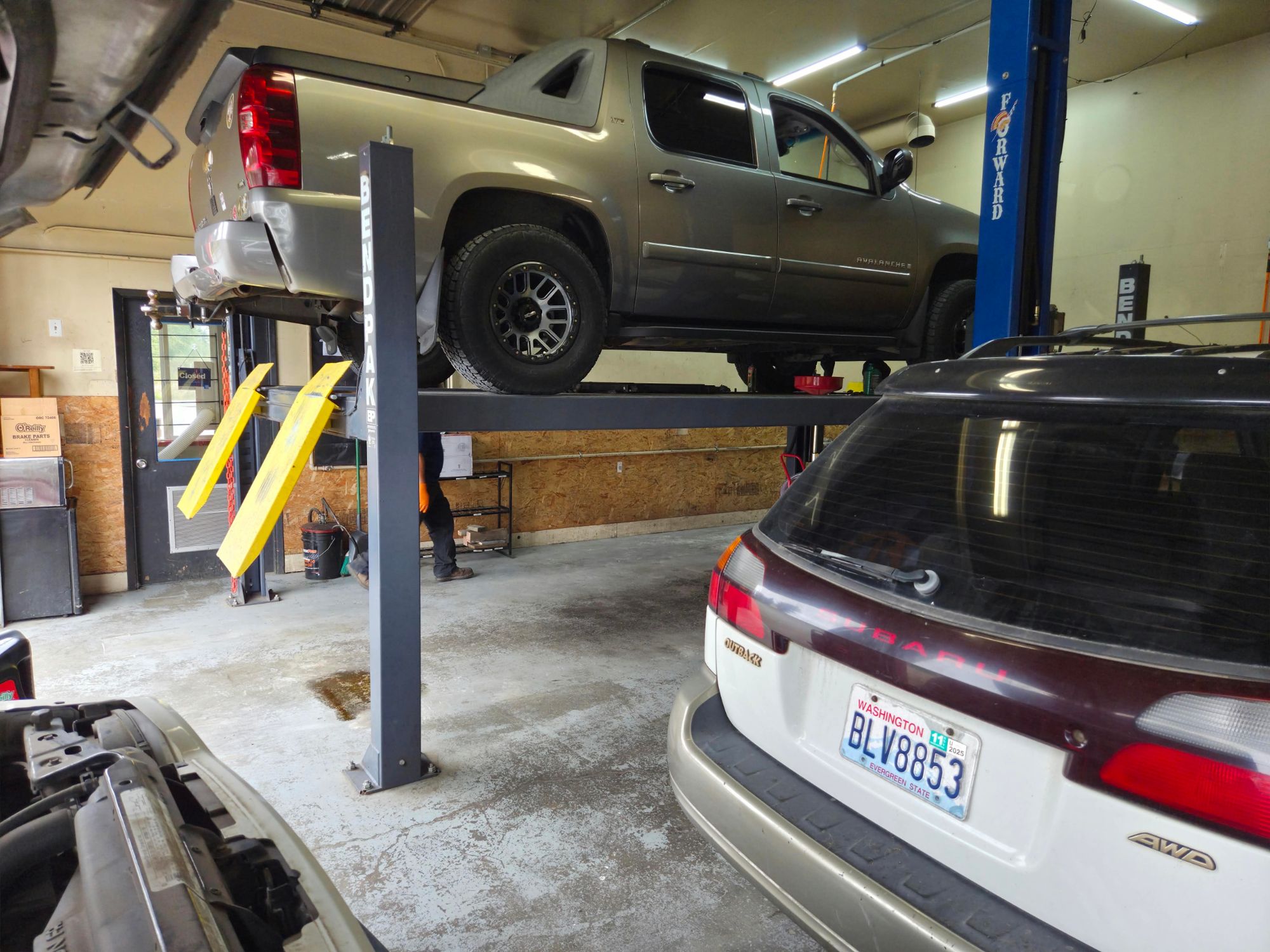 Chevrolet Avalanche on the four-post lift