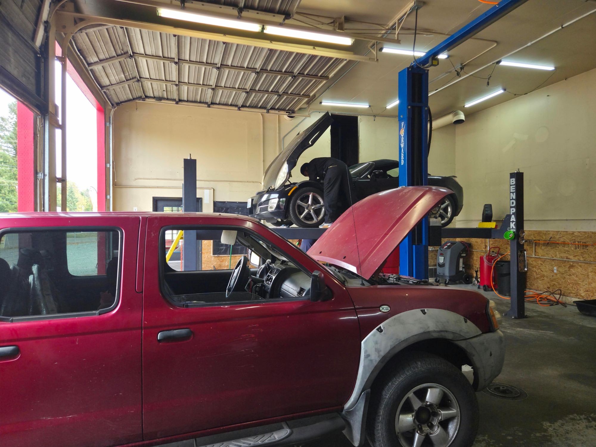 Nissan Frontier and other vehicles in for service