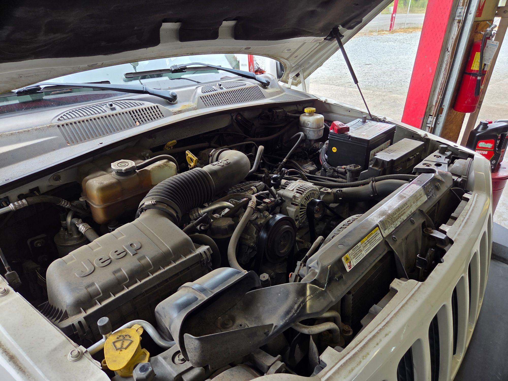 Close-up of a Jeep engine bay during service