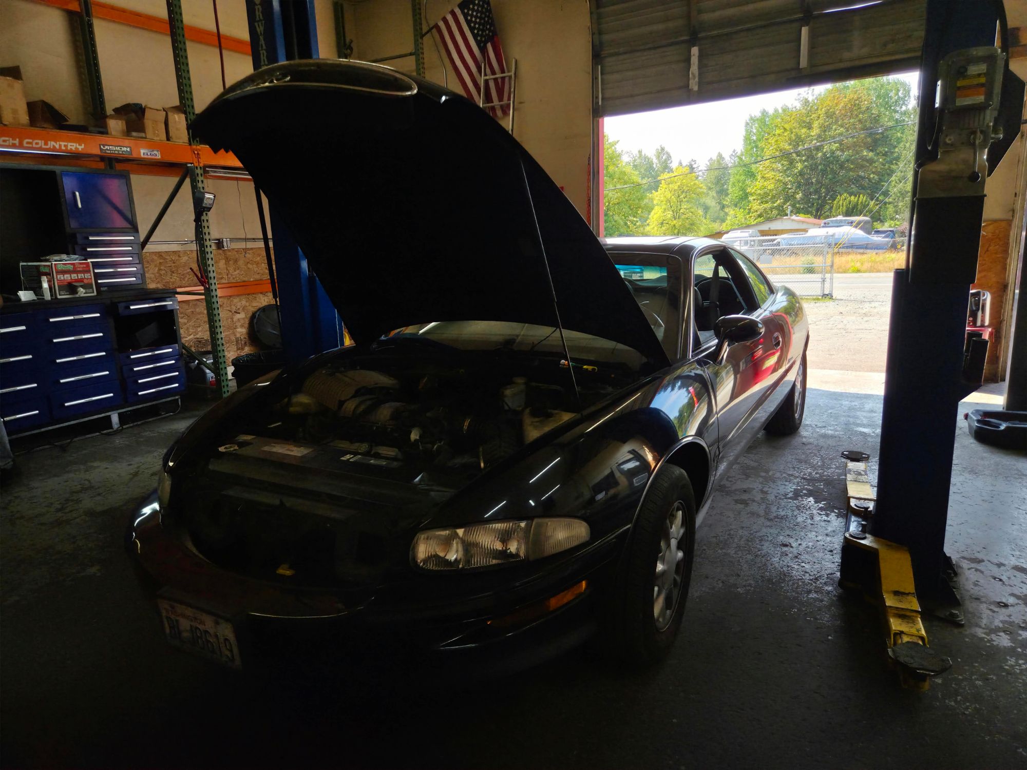 Engine bay open for diagnosis at Auto Star